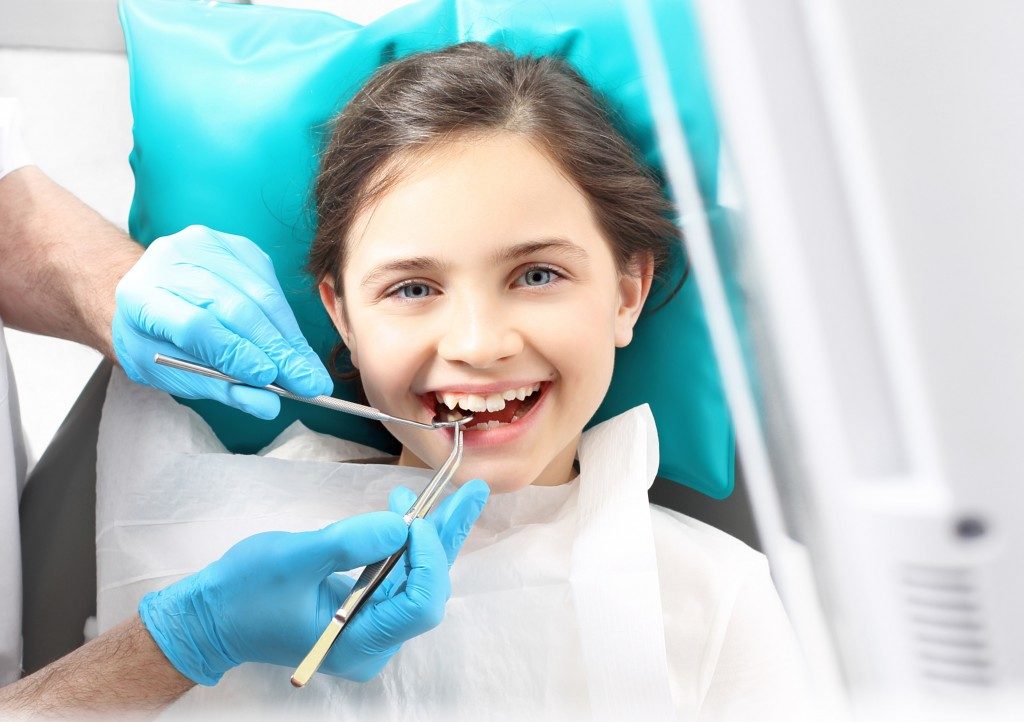 Little girl having a dental appointment