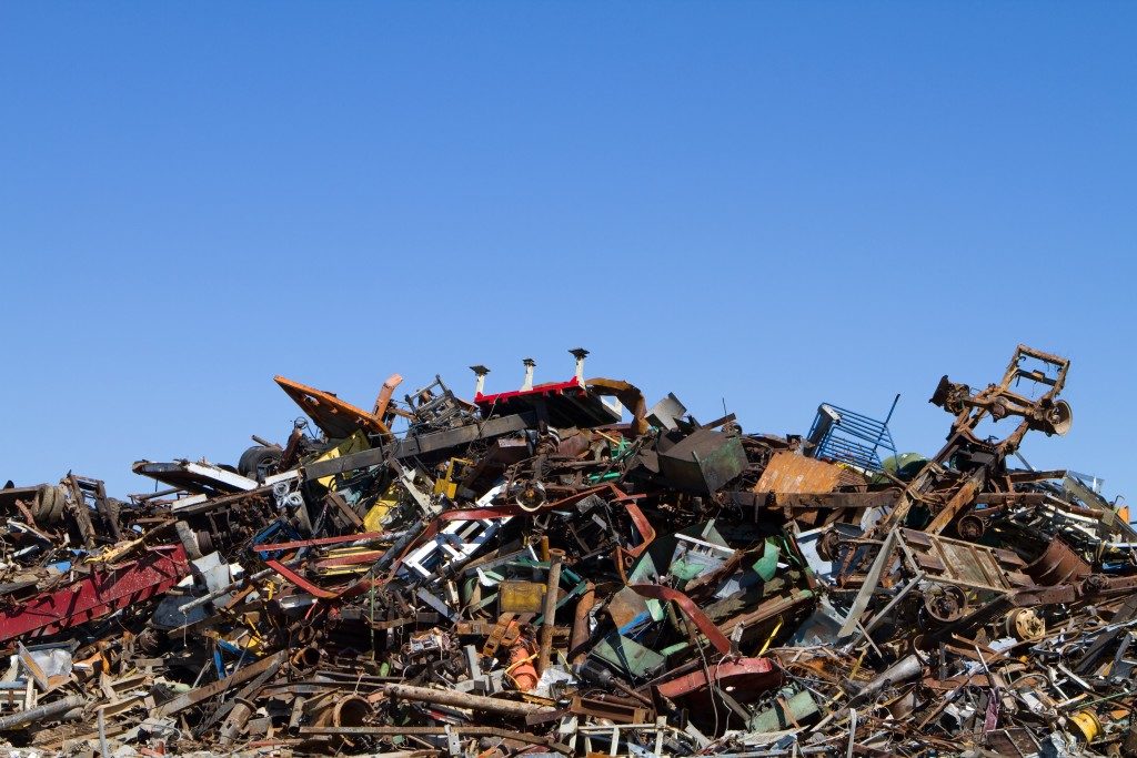 Scrap metal waste is stored in a recycling yard