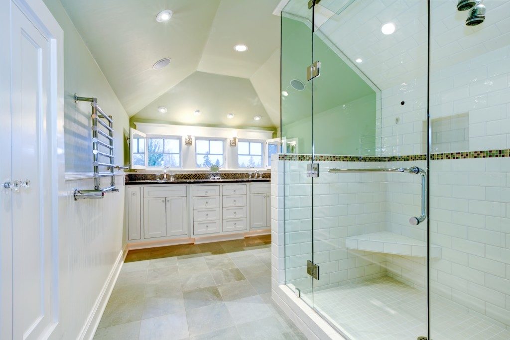 A newly renovated bathroom with porcelain floors