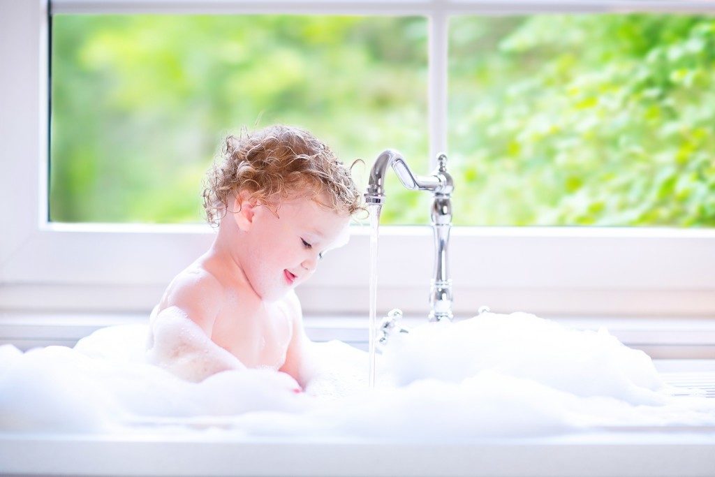 child in a bathtub