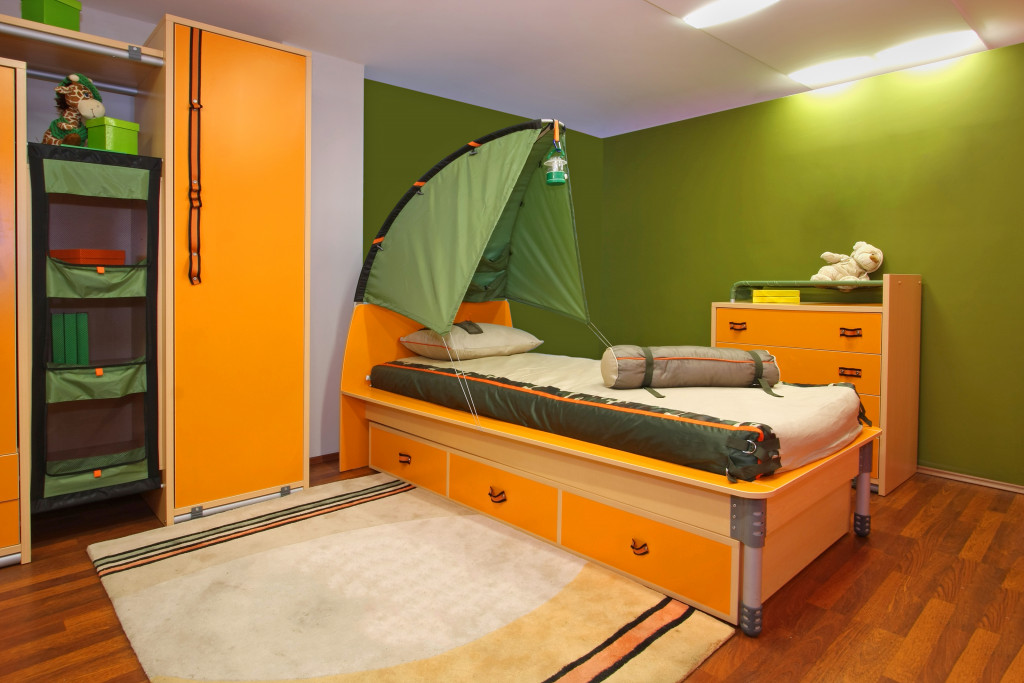 Child's bed with a built-in tent.