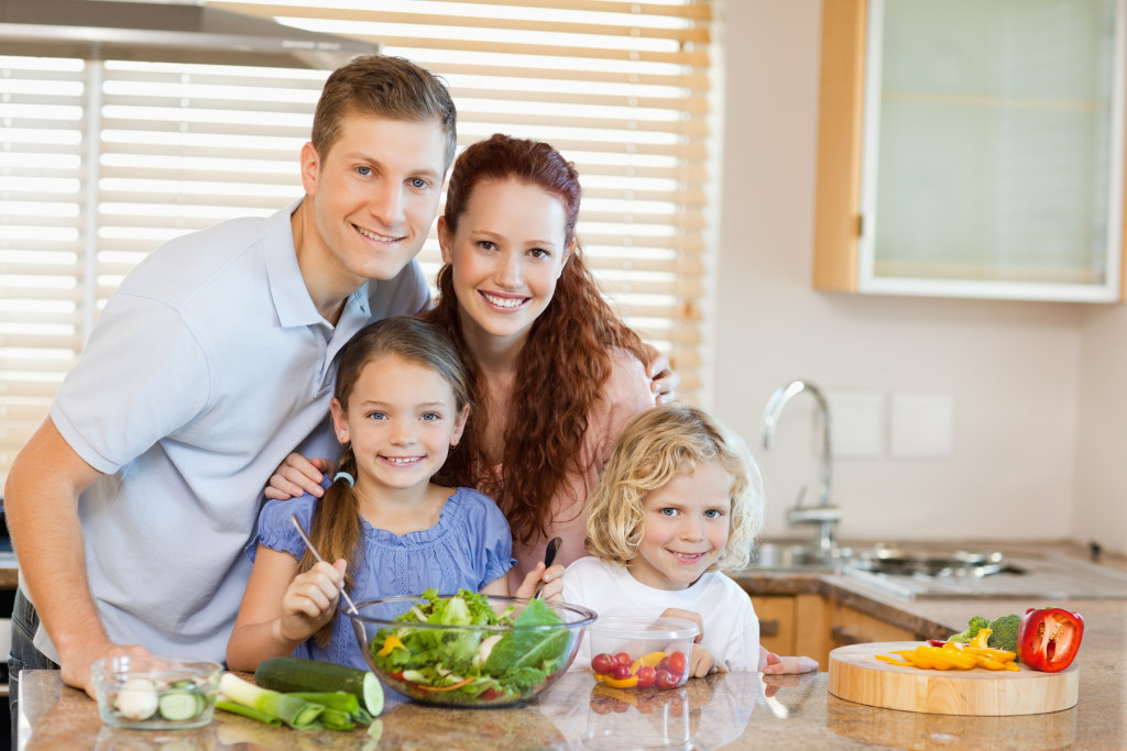 family preparing a healthy snack 