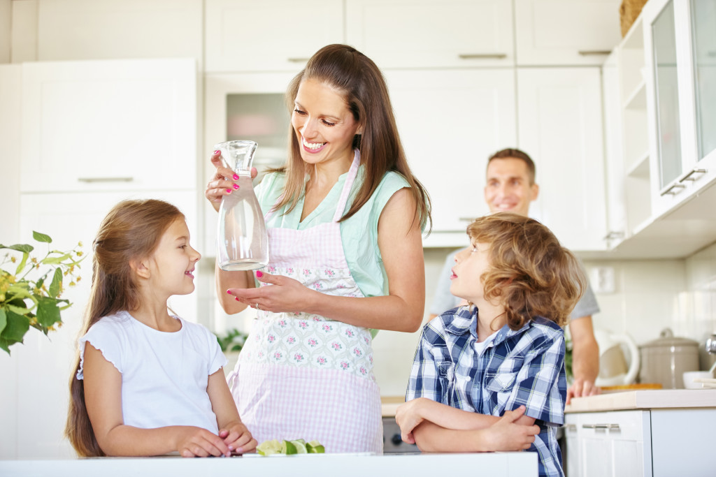 mom asking children to drink water