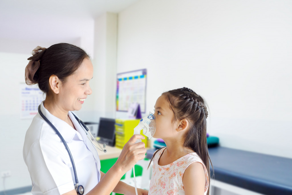 healthcare worker taking care of a child