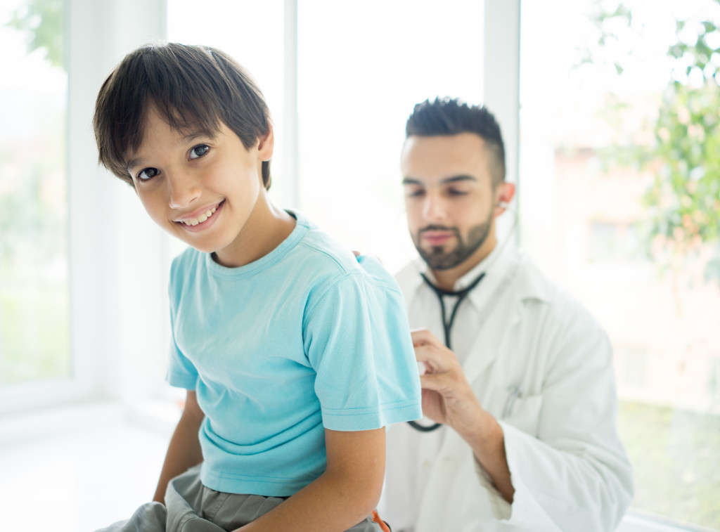 A kid getting a checkup