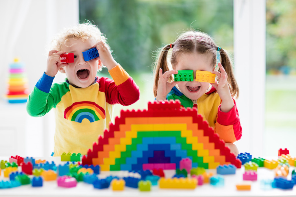 kids playing with colorful blocks